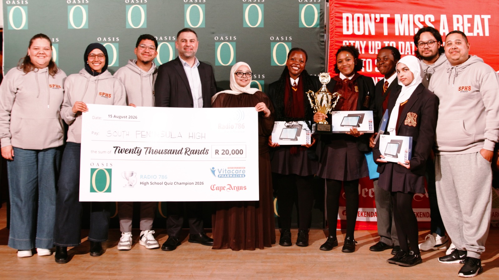 South Peninsula High School quiz winners with their trophy